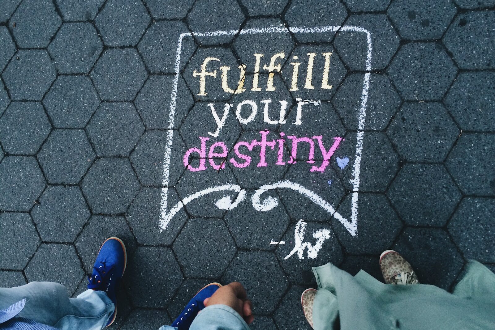 two person standing on full your destiny pavement artwork